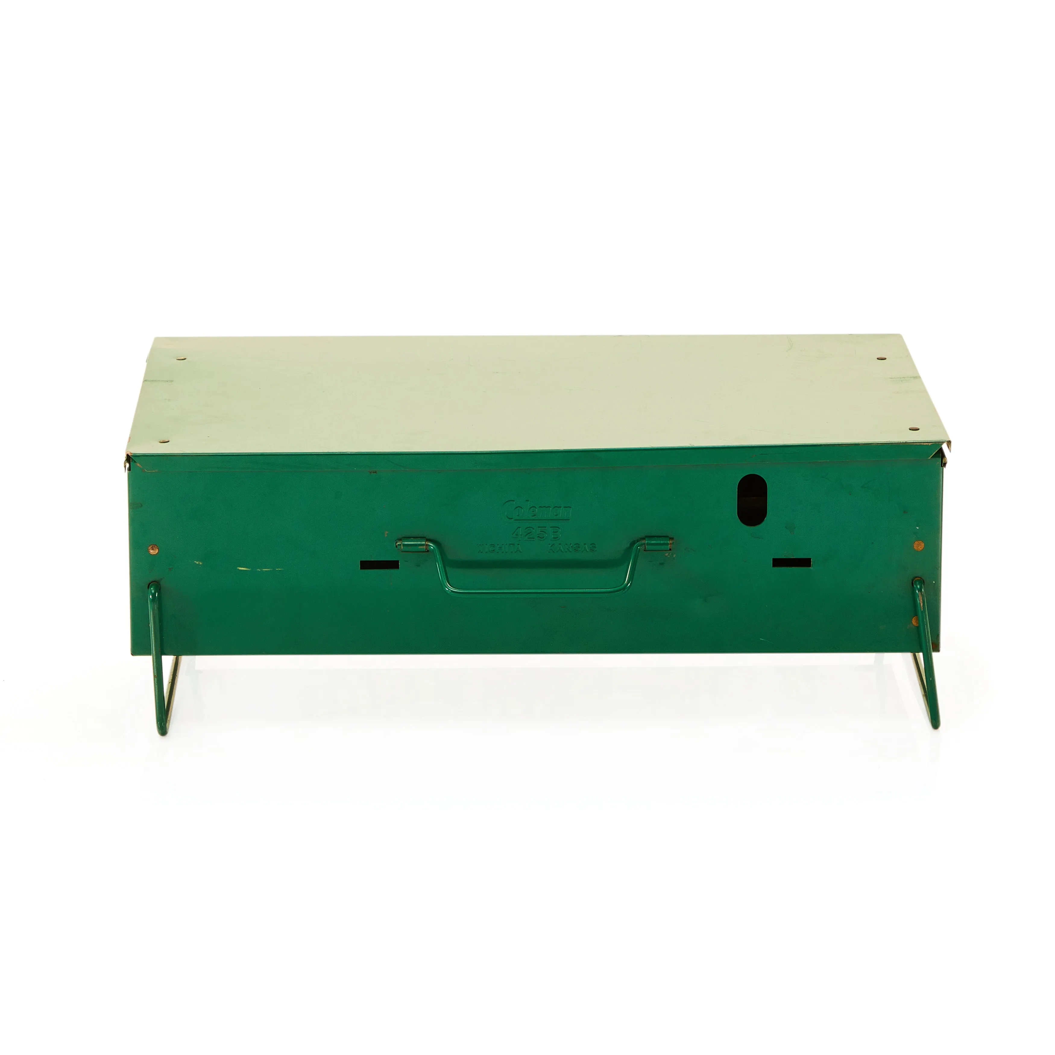 Green Metal Coleman Folding Camping Stove